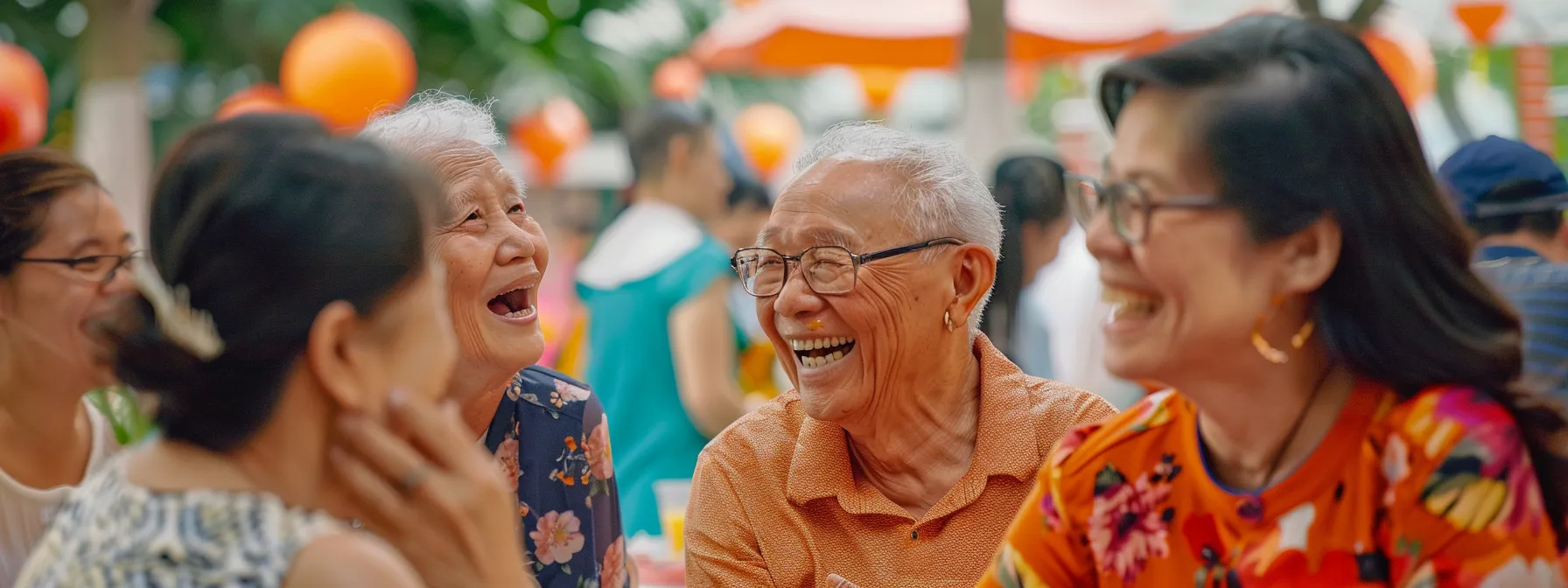 a diverse group of residents laughing and chatting at a colorful community event in sembawang.